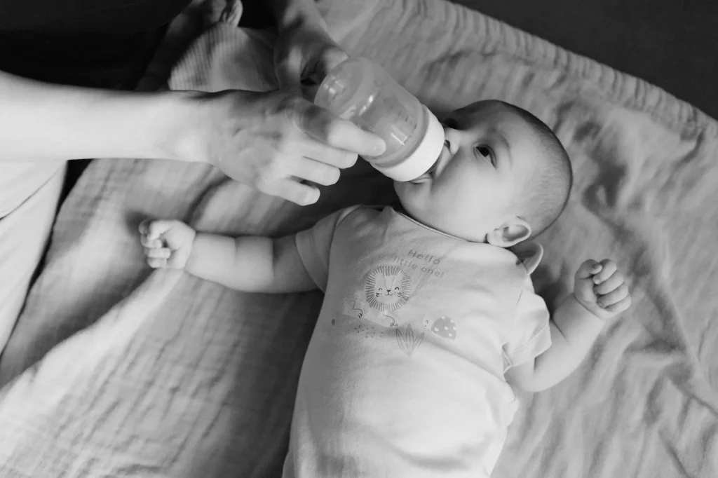 Baby bottles with milk ready for infant feeding