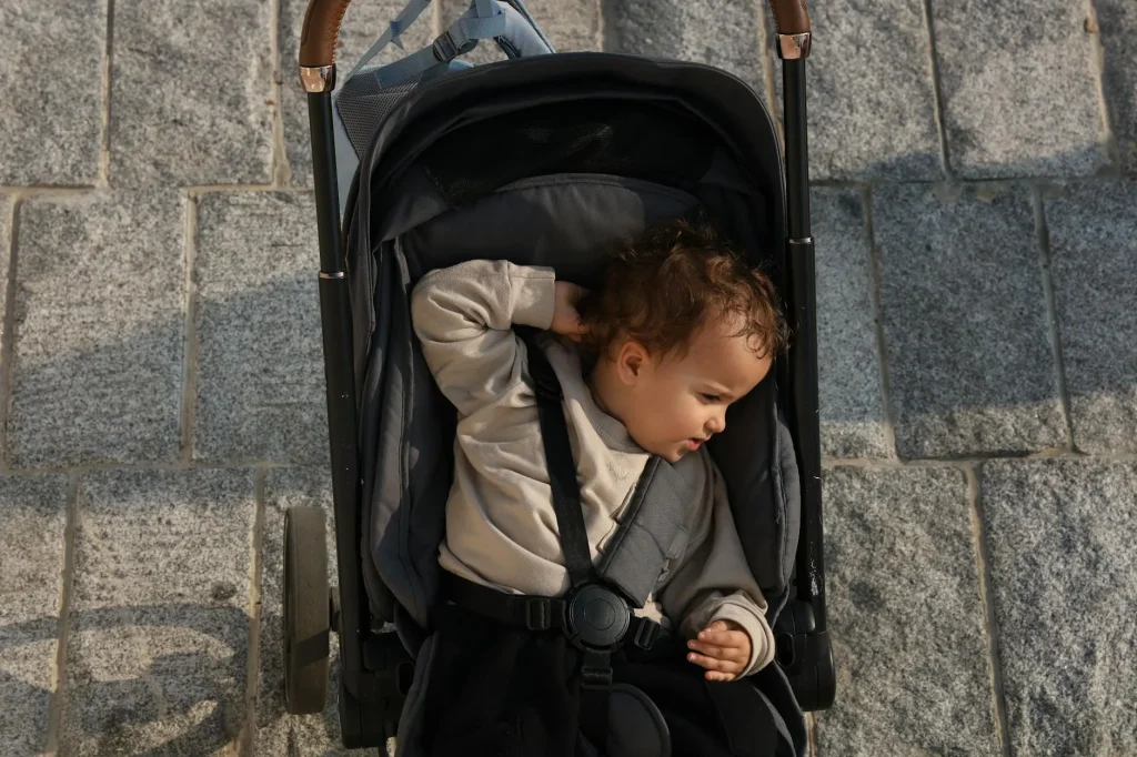 Row of pushchairs on display in a baby gear shop