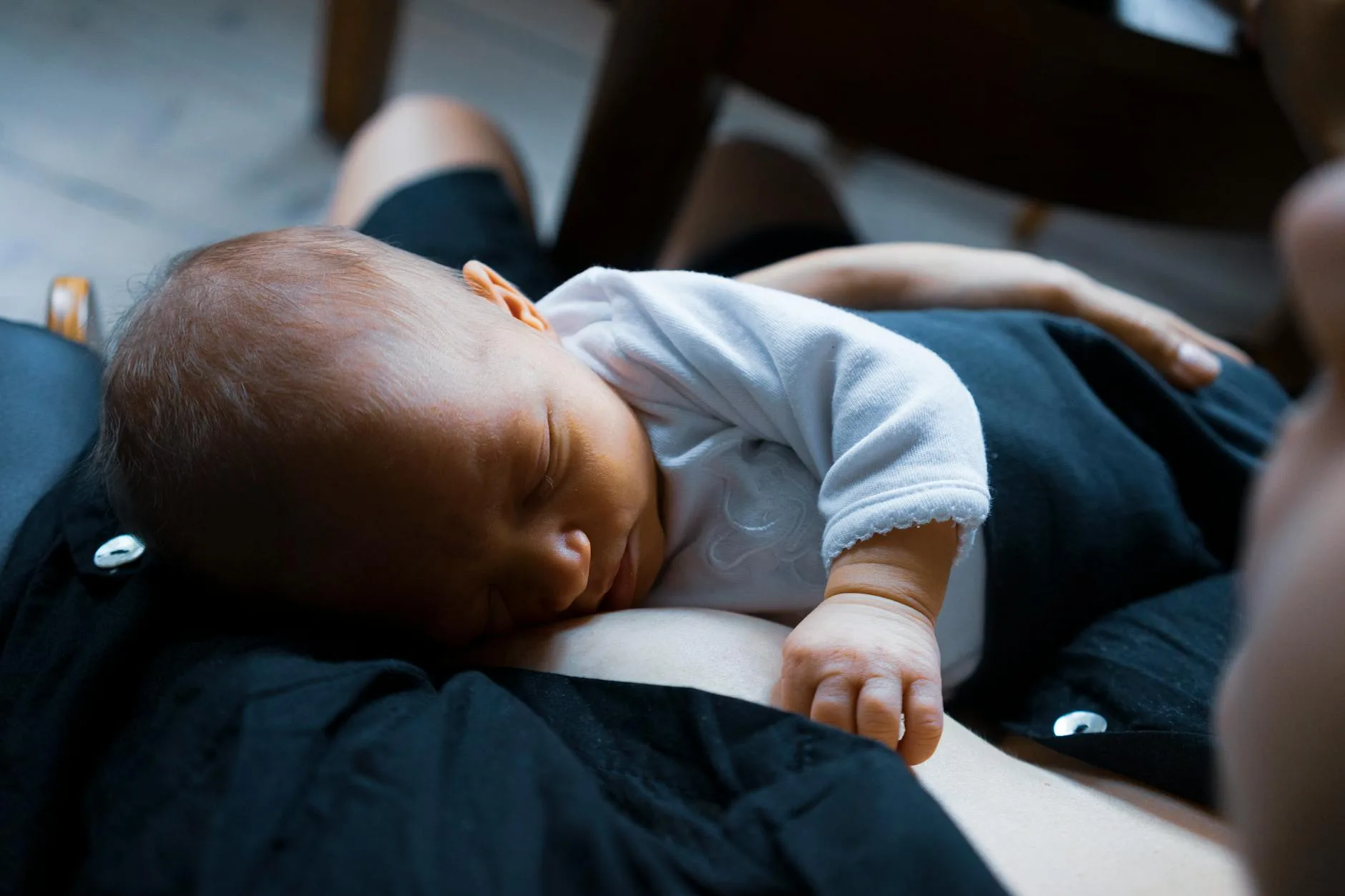 Baby sleeping peacefully after a feed