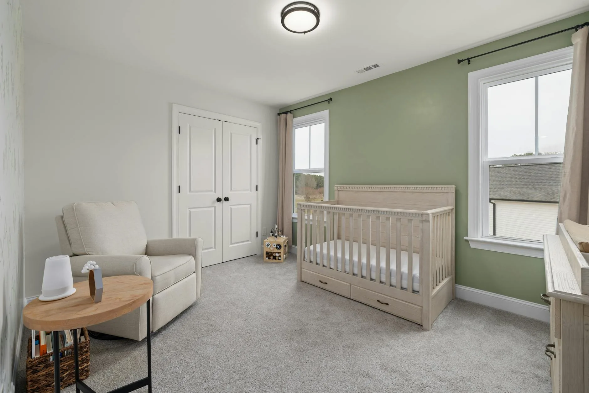 Calm nursery room with a soft night light for baby monitoring