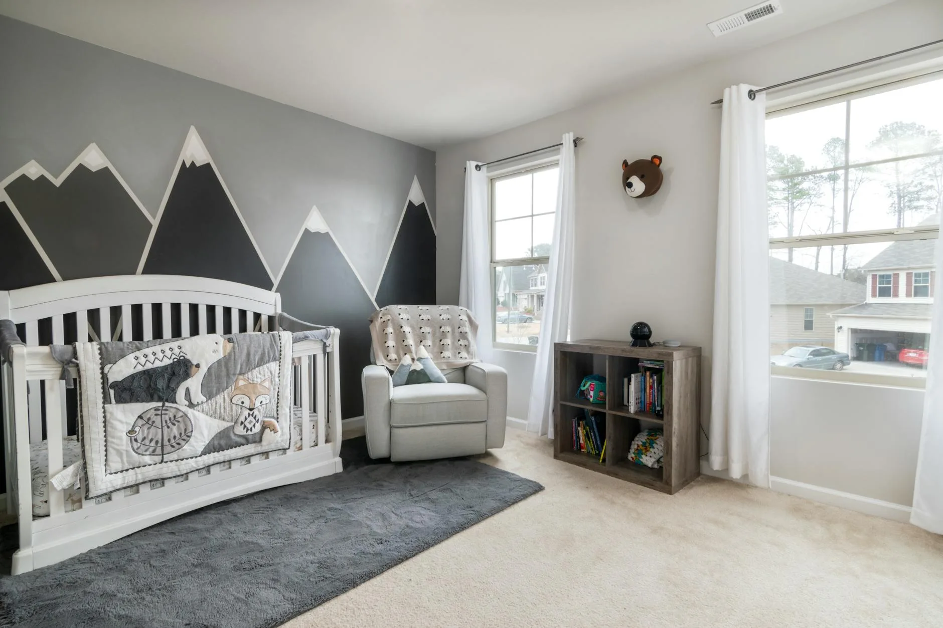 Nursery room with cot and neutral decor
