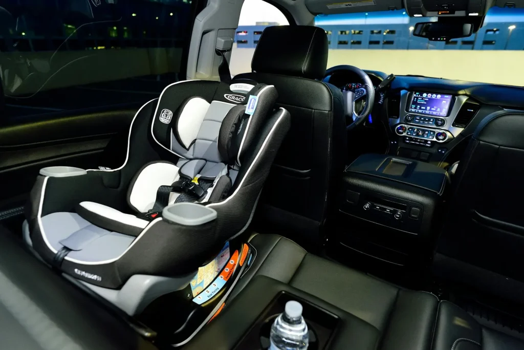 Child car seat properly installed in a vehicle for safe travel
